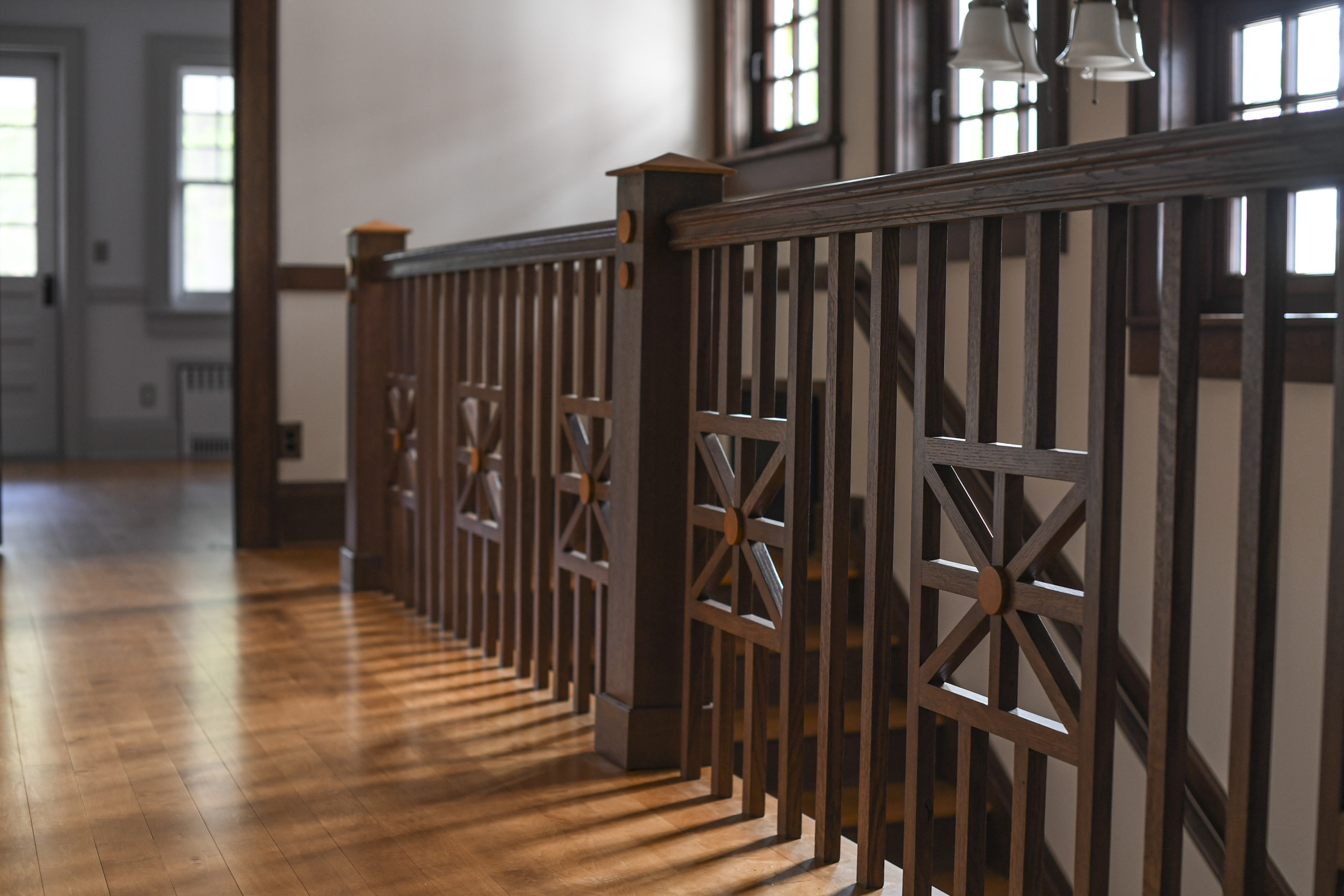 Addirondack Inspired Custom Stair Railing by Luxury Residential Builder in Lake Placid, NY